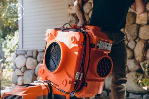 911Restoration-carrying-blower San Diego